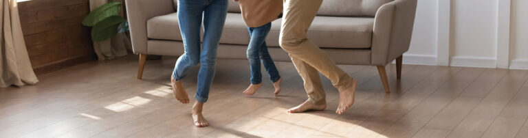 family dancing on vinyl plank hero | America's Carpet Barn